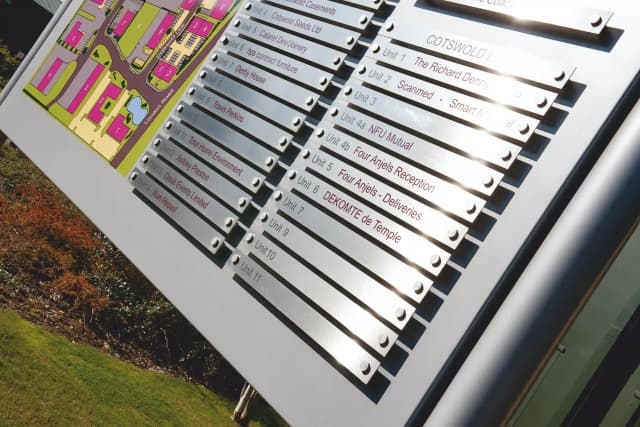 Sign system using easily removed slats, making a readily updated wayfinding solution.